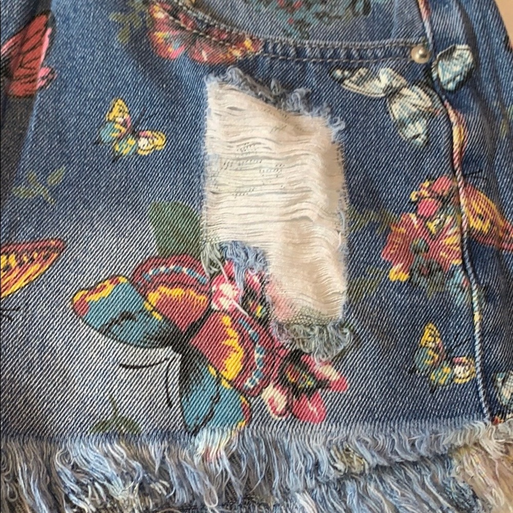 BLUE RIPPED BUTTERFLY DENIM SHORTS WITH RAW HEM - Picture 8 of 10